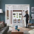 Premium White Freefold Interior Folding Door System with Clear Glazed Doors and Versatile Room Configuration Options