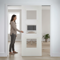 Premium Telescopic Pocket Door System with White Glazed Panels and Comprehensive Timber Lining Kit