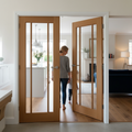 Premium Glazed Internal Door with Clear Safety Glass and Real Oak Veneer for Enhanced Light Flow and Privacy Options