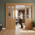 Premium Double Sliding Door System with Clear Glazed Oak Doors and Track Mechanism for Stylish Interiors