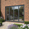 External Folding Patio Door in Matt Grey Aluminium with 3+1 Clear Glass