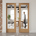Premium Clear Glazed Double Pocket Door Set with Oak Frame for Elegant Space Transformation