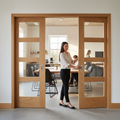 Premium Double Pocket Door System with Clear Glazed Oak Doors and Galvanised Steel Frame for Seamless Interior Design