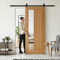 Premium Oak Internal Fully Finished Sliding Door with Clear Offset Glass Design and Black Top Mounted Kit for Modern Spaces