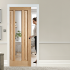 Premium Clear Glazed Pocket Door Set with Unfinished Oak Panels and Adjustable Frame Options for Space-Saving Solutions