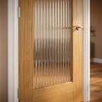 Internal Oak Door with Fully Finished Surface and 1 Light Reeded Glass - detail view