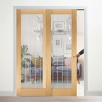 Professional Oak Glazed Telescopic Pocket Door System with Clear Panels and 15-Year Guarantee