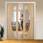 Premium Clear Glazed Double Pocket Door System with Unfinished Oak Construction and Galvanised Steel Frame for Modern Homes