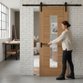 Premium Oak Internal Fully Finished Sliding Door with Clear Glass Panel and Black Top Mounted Mechanism