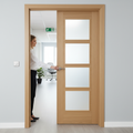 Premium Fully Finished 4 Light Clear Glazed FD30 Fire Door with Contemporary Oak Design and V Grooves