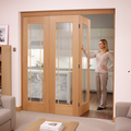 Premium Clear Glazed Bifolding Doorset with Unfinished Oak Detailing - Versatile Room Divider with Multiple Configurations and Sizes