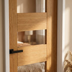 Fully Finished Oak Internal Door with 7 Panels and Clear Glass Lights - detail view
