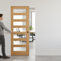 Premium Clear Glazed Flush Pocket Door Set with Bevelled Oak Panels and Innovative No Bottom Track Design