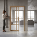 Premium Clear Glazed Pocket Door System with Blonde Oak Finish and Galvanised Steel Frame for Modern Interiors